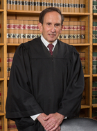 The Honorable Robert Greco